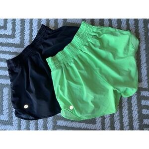 (2) pairs of Lululemon Hotty Hot high-rise lined shorts neon green/black